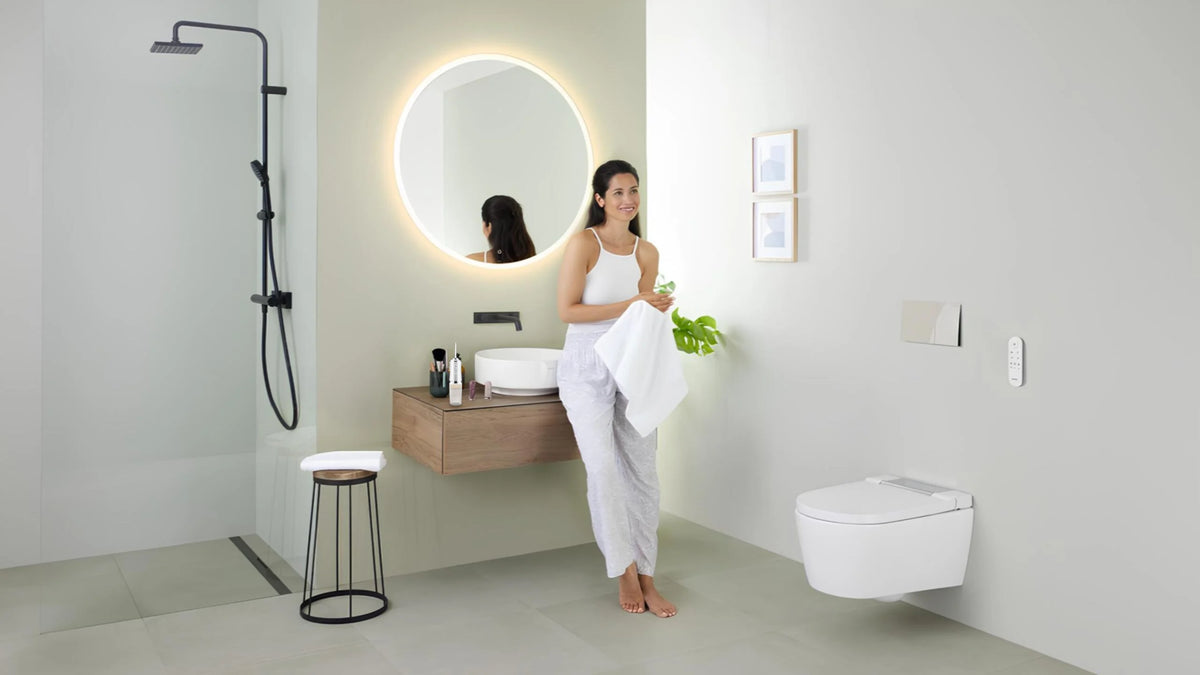 Techify™ dental irrigator shown in a lifestyle setting, highlighting easy use, superior cleaning technology, and everyday oral hygiene in a bathroom
